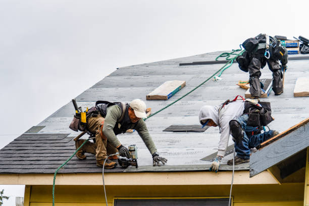 Professional Gutter Installation technician working in Winchendon, MA